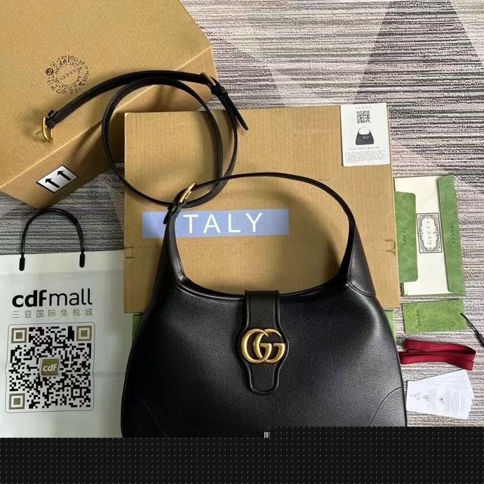 G*u*i top handle bags